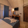Отель Escape Cave Suites, фото 4