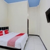 Отель OYO 92594 Raja Ratu Homestay, фото 4