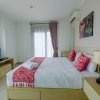 Отель Cozy 2BR Apartment with Sofa Bed at Tamansari Semanggi, фото 2