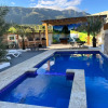 Отель B-8 hermoso apartamento al pie de la montaña con piscina total mente equipado, фото 10