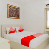 Отель OYO 1242 Aeropolis Apartment, фото 4
