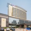 Отель Guanghua International Hotel, фото 4