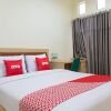 Отель OYO 1681 The Kost Tdm 2, фото 4