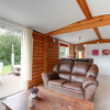 Отель Wooden Tree Trunk Bungalow at Fish Pond in Hoge Hexel, Optional with Hot Tub, фото 2