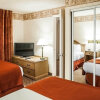 Отель Pan American Inn & Suites, фото 6