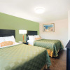 Отель Executive Inn and Kitchenette Suites, фото 7