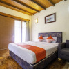 Отель OYO 2640 Rumah Kayu Cottage Syariah, фото 2