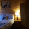 Отель Lochinvar - Highland Log Cabin with Private Hot Tub, фото 4