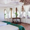 Отель Capricorn Beach Cottages в Киманг'а