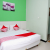 Отель OYO 1138 Purple Hotel, фото 6