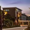 Отель La Quinta Inn & Suites Orlando IDrive Theme Parks в Орландо