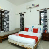 Отель OYO 4673 Anies Garden, фото 9
