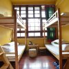 Отель Lijiang Ancient Town International Youth Hostel, фото 3