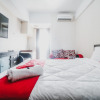 Отель RedLiving Apartemen Green Lake View Ciputat - Pelangi Rooms Tower E, фото 4
