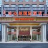 Отель Vienna International Hotel (Huanggang Normal College Ruitian Plaza), фото 1