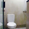 Отель Djuragan Kamar Gunung Anyar, фото 7