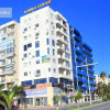 Отель The White Pearl Suite - beach front city centre with sea view., фото 1