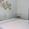 Отель Cozy Studio Room Apartment At Aeropolis Residence, фото 6