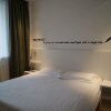 Отель Motel 168 Shenyang North Station North Exit Branch в Шэньяне