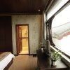 Отель Bo Ai Inn- Lijiang, фото 12