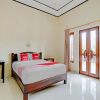 Отель OYO 90458 Pucuk Bali Guest House, фото 3