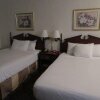 Отель Plantation Oaks Suites & Inn, фото 6