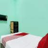 Отель OYO 92521 Guest House Inayah Syariah, фото 10