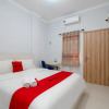 Отель RedDoorz Syariah near Stasiun LRT Bumi Sriwijaya, фото 1