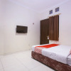 Отель OYO 138 Graha 99, фото 4