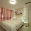 Отель Biden Sheng Di Apartment Linyi, фото 11