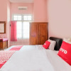 Отель OYO 2061 Rizki Dhira Guest House Syariah, фото 15