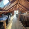 Отель Woodpecker Log Cabin with hot tub, pizza oven bbq entertainment area, lakeside with private fishing , фото 2