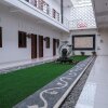 Отель OYO 2587 Enfaza Guesthouse Syariah, фото 1