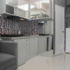 Отель Comfortable and Clean 2BR Green Pramuka Apartment, фото 10