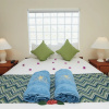 Отель Sunbreeze Suites, фото 2
