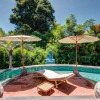 Отель Secluded Wooden Villa, 3 BR, Canggu With Staff, фото 8