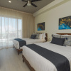 Отель Entire modern apartment | 2 min walk to the beach | private rooftop pool, фото 21