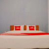Отель OYO 1509 Candi Panggung Family Guest House Syariah, фото 7