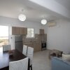 Отель Island Dreaming Opal 2 Bd w shared pool, фото 16