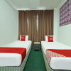 Отель Oyo 90631 Syahirah Hotel, фото 4