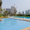 Отель Comfortable Studio With Pool View At Sky House Bsd Apartment, фото 12