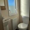 Отель Beautiful 3 bed Caravan in Felixstowe, фото 8