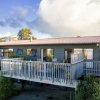 Отель Talinga Ocean Views - Mangawhai Holiday Home в Мангафаи Хедс