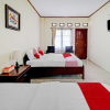 Отель Collection O 90461 Graha Atmadja Syariah Guest House, фото 11