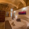 Отель Valletta Merisi Suites, фото 2