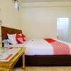 Отель OYO 1425 Beach Wind Bungalows, фото 6