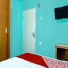Отель OYO 91731 Home Stay Elis Cateliya Syariah, фото 23