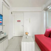 Отель Warm And Homey 2Br At Bassura City Apartment, фото 6