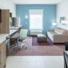 Отель Home2 Suites by Hilton Orlando Airport, фото 4