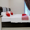 Отель OYO 92233 Srikandi Homestay Syariah, фото 4